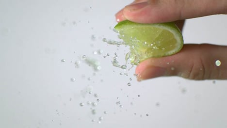 Squeezing-Slice-of-Lime-Super-Slow-Motion